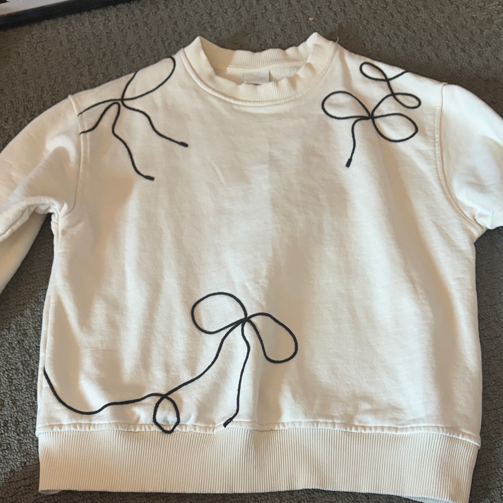 Zara Kids Cream Sweatshirt with Black Ribbon Design